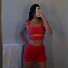 Kendall Jenner wears a cutout alo yoga workout set in her bathroom