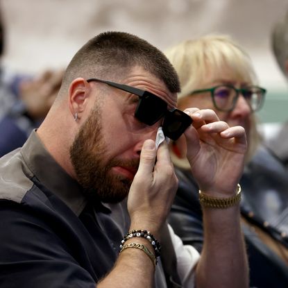  Travis Kelce #87 of the Kansas City Chiefs reacts during his brother, Jason's, retirement from the NFL at NovaCare Complex on March 04, 2024 in Philadelphia, Pennsylvania.