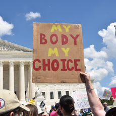 A pro-abortion rights advocate protests outside of the Supreme Court.